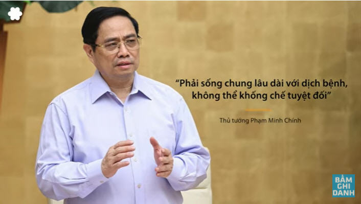 Cuối cùng Thủ Tướng CSVN Phạm Minh Chính phải xuống giọng "...sống lâu với dịch." Ảnh: Youtube Việt Tân