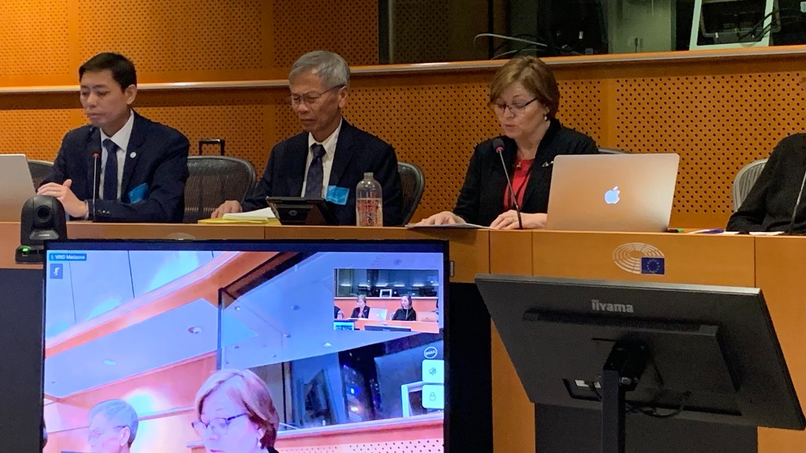 Một số trong các diễn giả của buổi hội thảo (từ trái): Anh Trần Đức Tuấn Sơn, đại diện tổ chức Việt Tân tại Âu Châu; ông Huy Nguyễn, Giám đốc tổ chức Bảo vệ Người Lao động Việt Nam (Vietnam Worker Defenders); và Dân biểu Nghị viện Châu Âu (European Parliament) Marianne Vind (đang phát biểu). Ảnh: Screenshot Cisco Webex